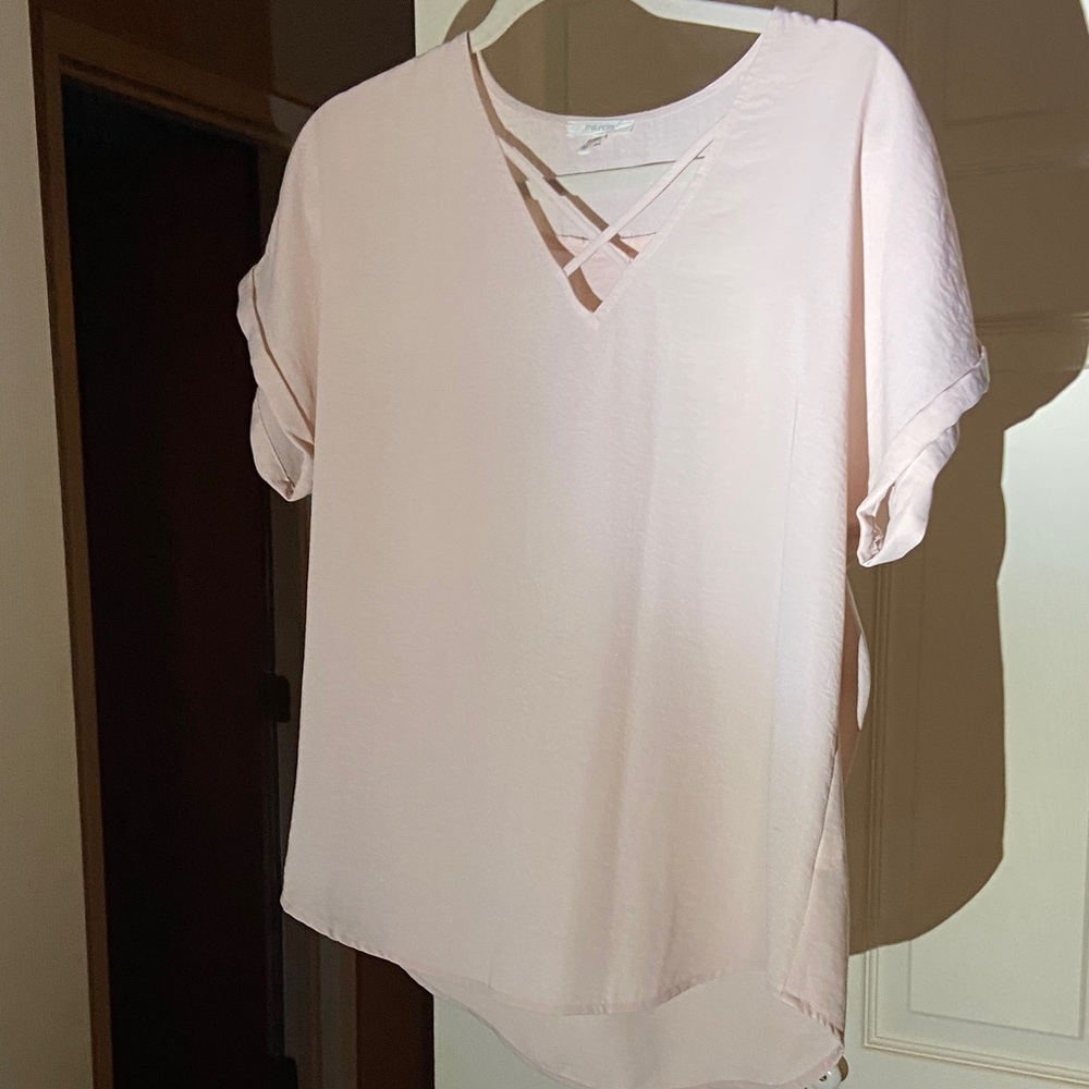 Maurice’s light weight baby pink V neck top. Size M